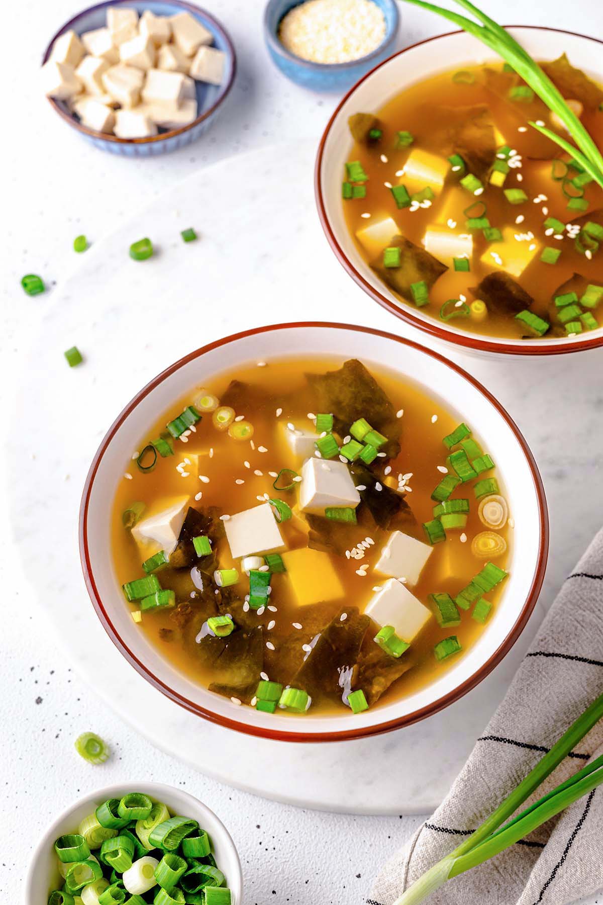 Two bowls with Tofu and Wakame Miso Soup 