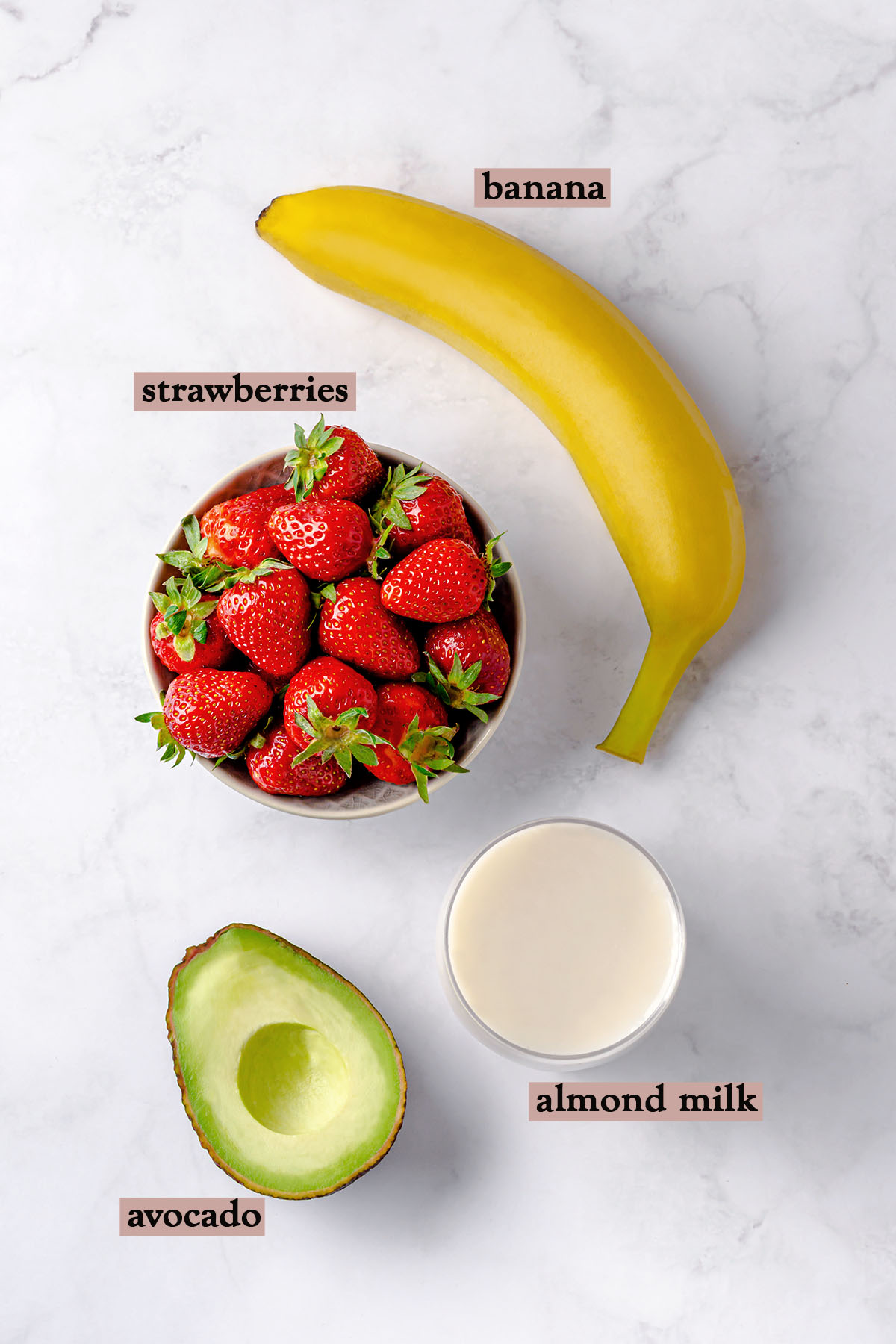 Ingredients for strawberry banana avocado smoothie