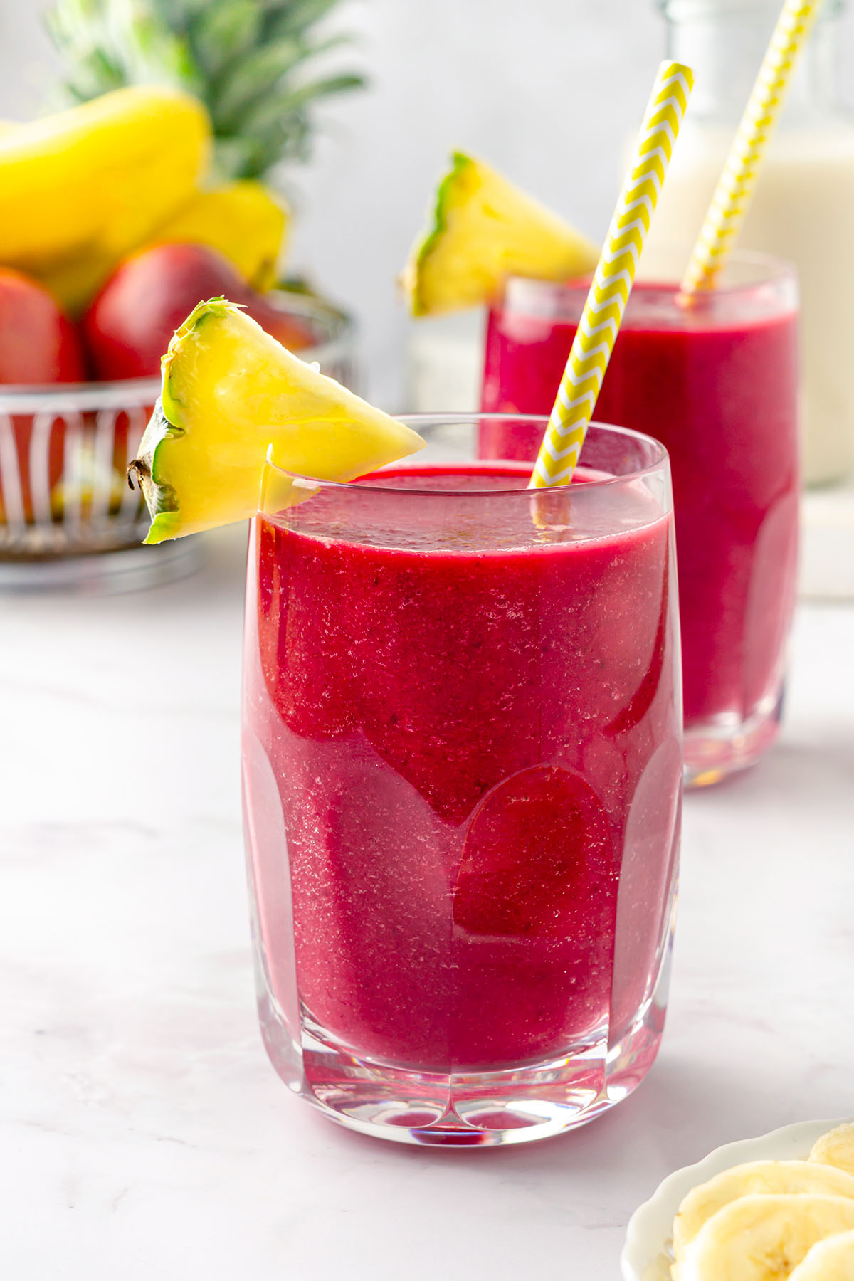 Beetroot pineapple smoothie in a serving glass