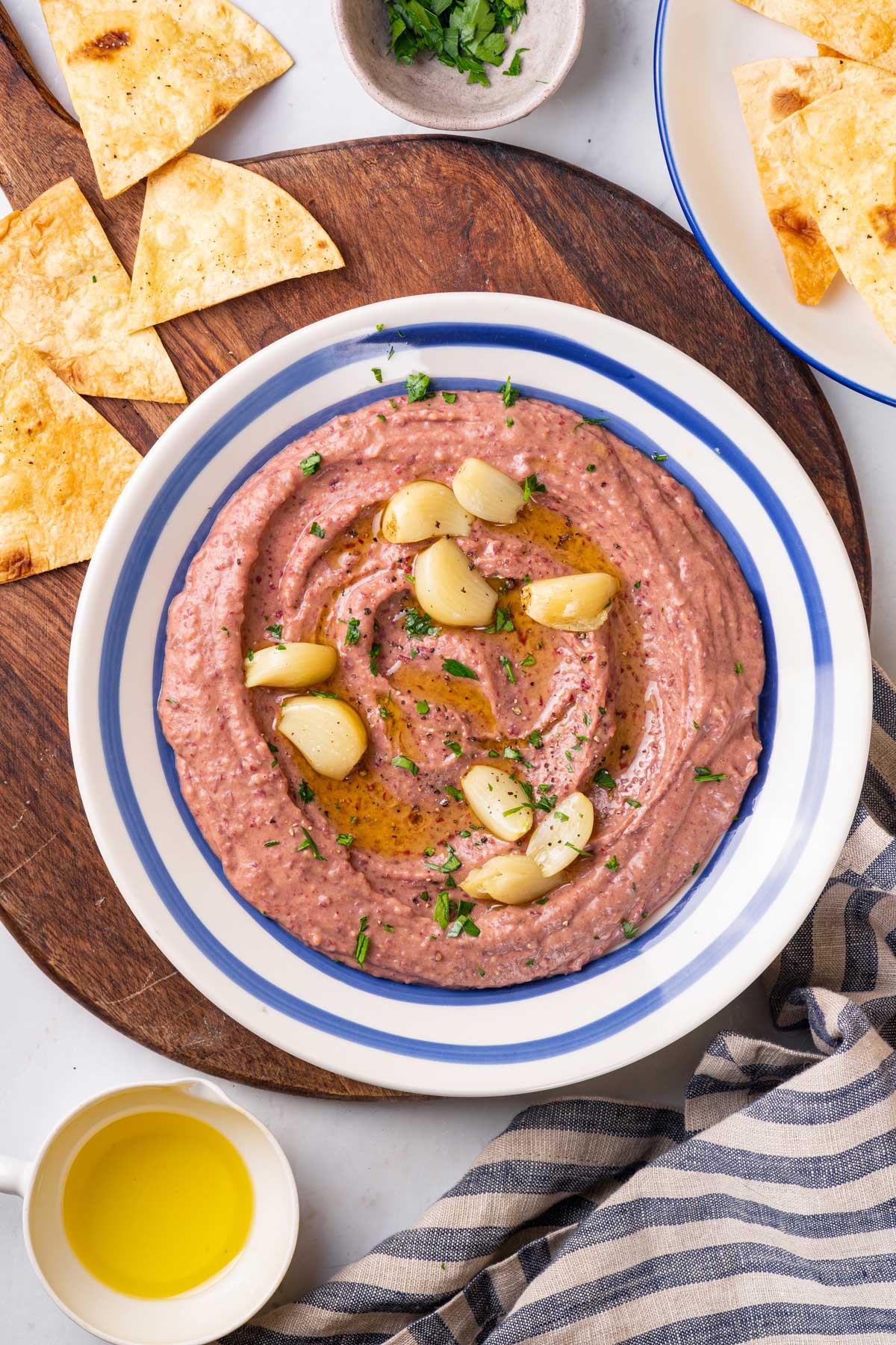 Bowl with red bean hummus with roasted garlic