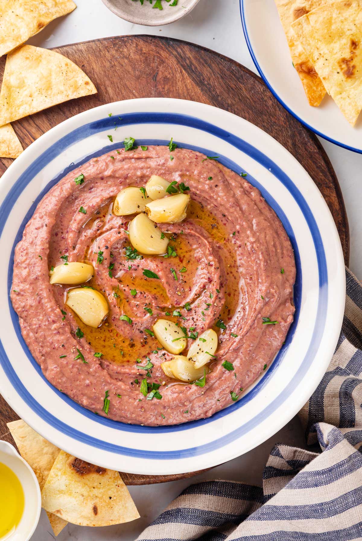Red bean hummus with roasted garlic in a serving bowl