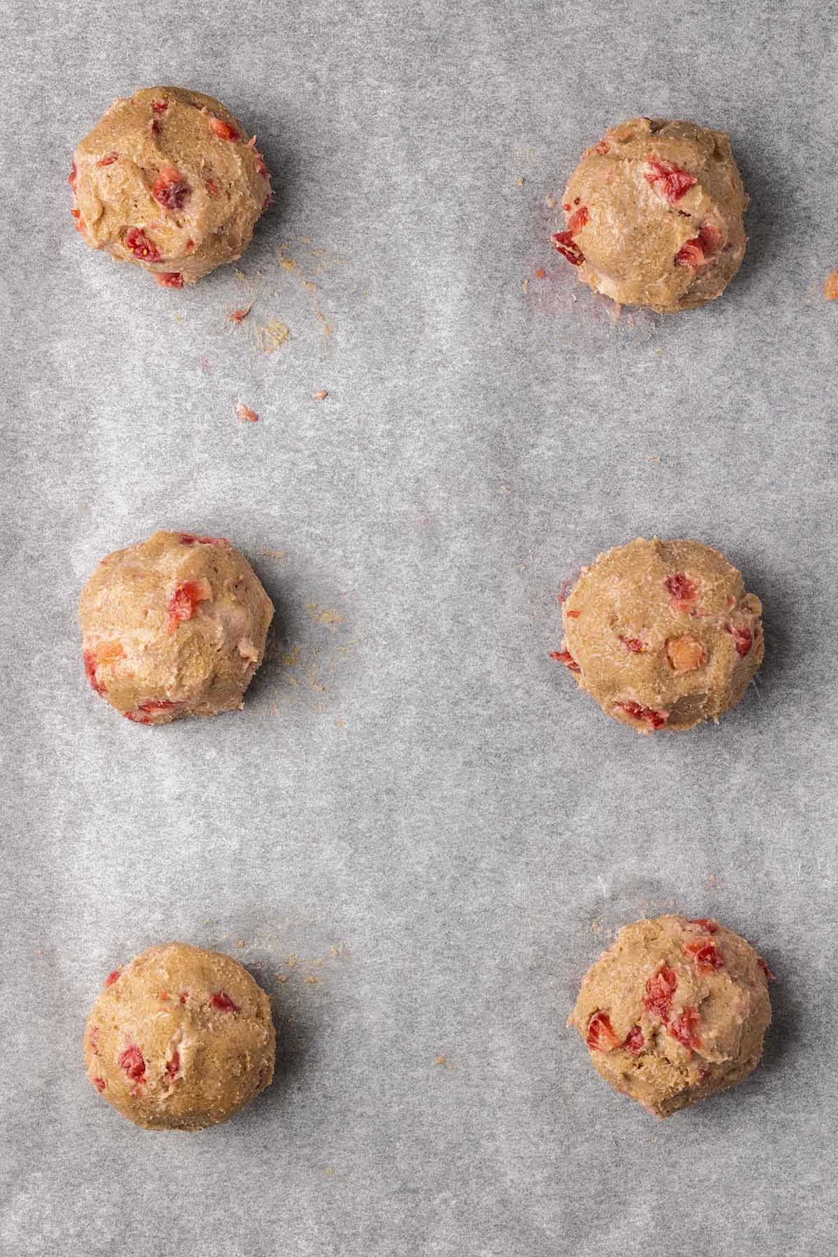 The process of making strawberry cheesecake cookies