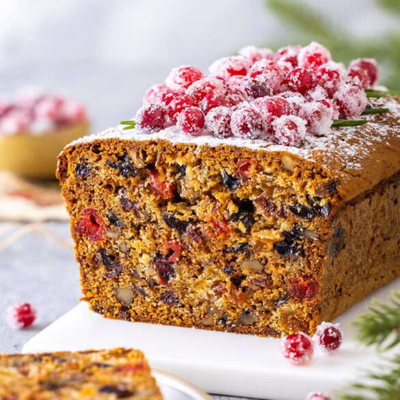 Fruit cake with sugared cranberries on top