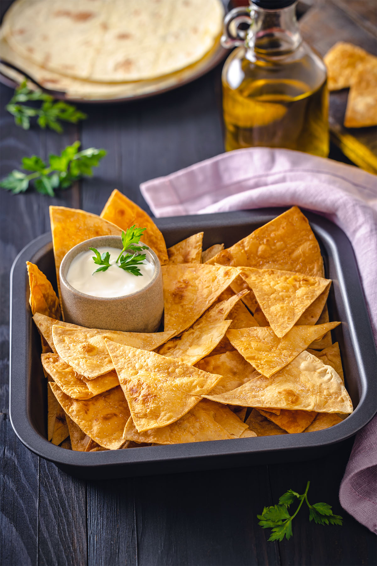 Homemade Tortilla Chips served with white sauce