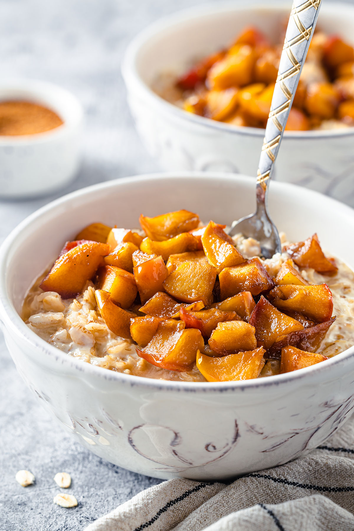 creamy oatmeal served with caramelized apples