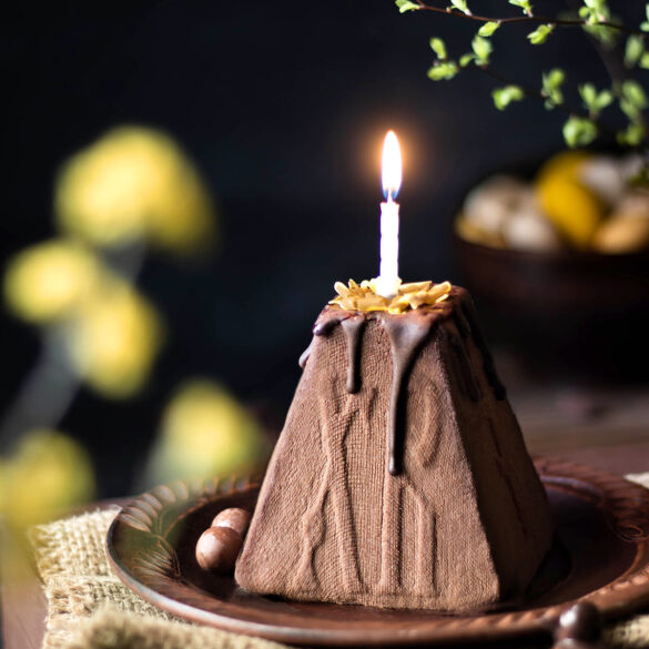 Chocolate Cheesecake Paska with candle on top