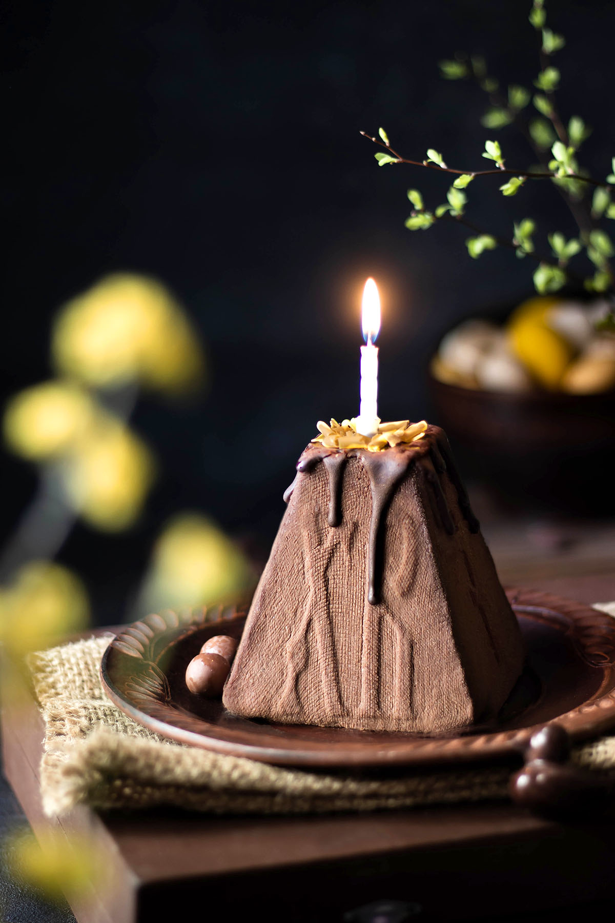 Chocolate Cheesecake Paska with candle on top