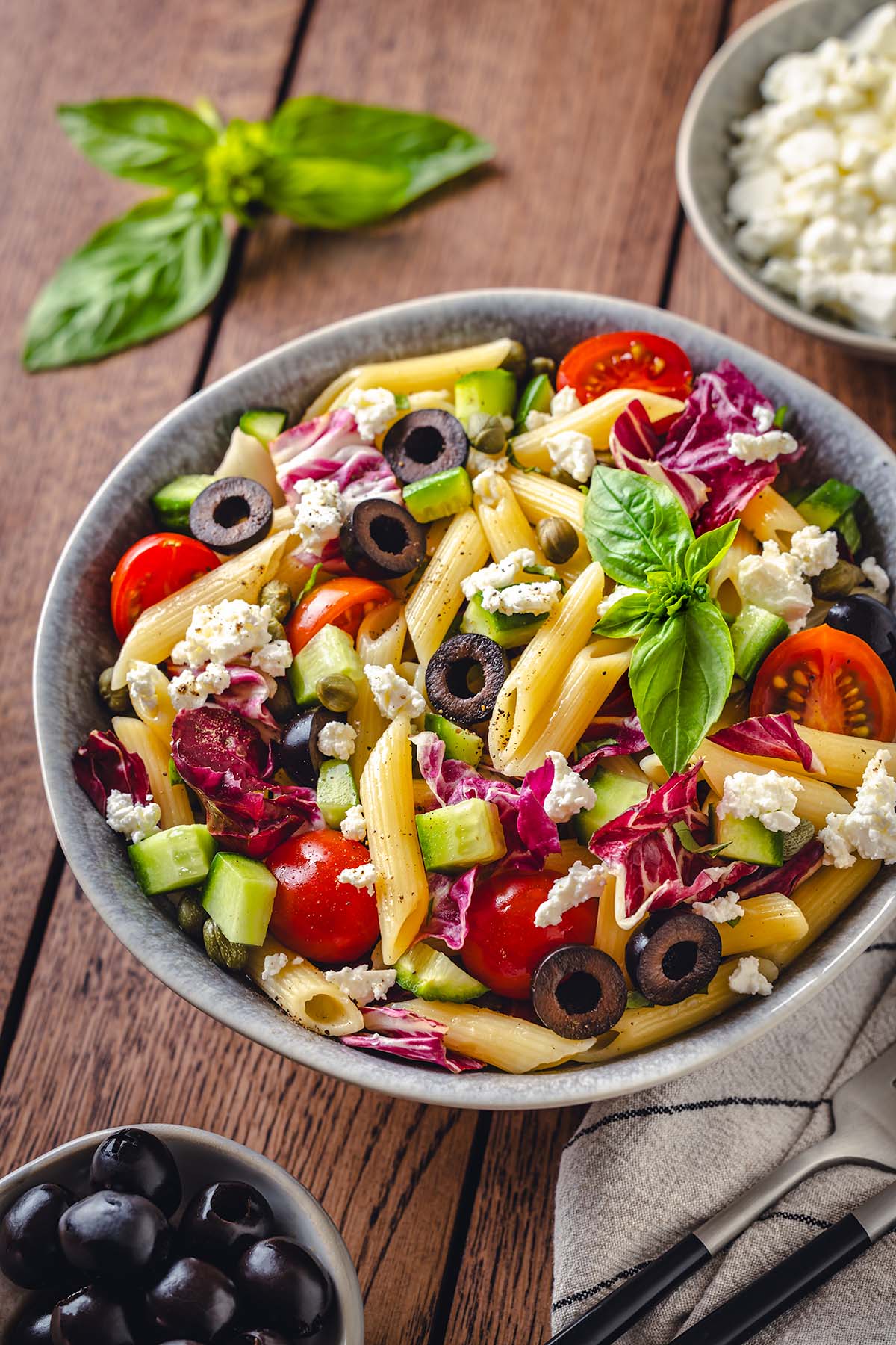 The plate with Sicilian salad with penne and veggies