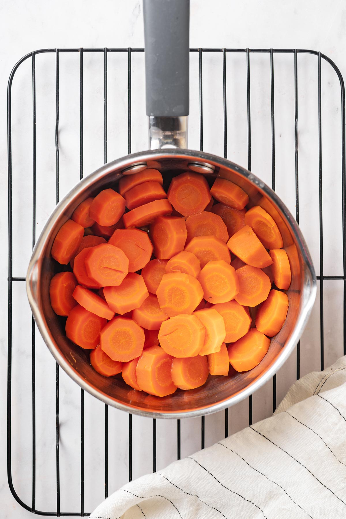 Chopped carrots in a saucepan